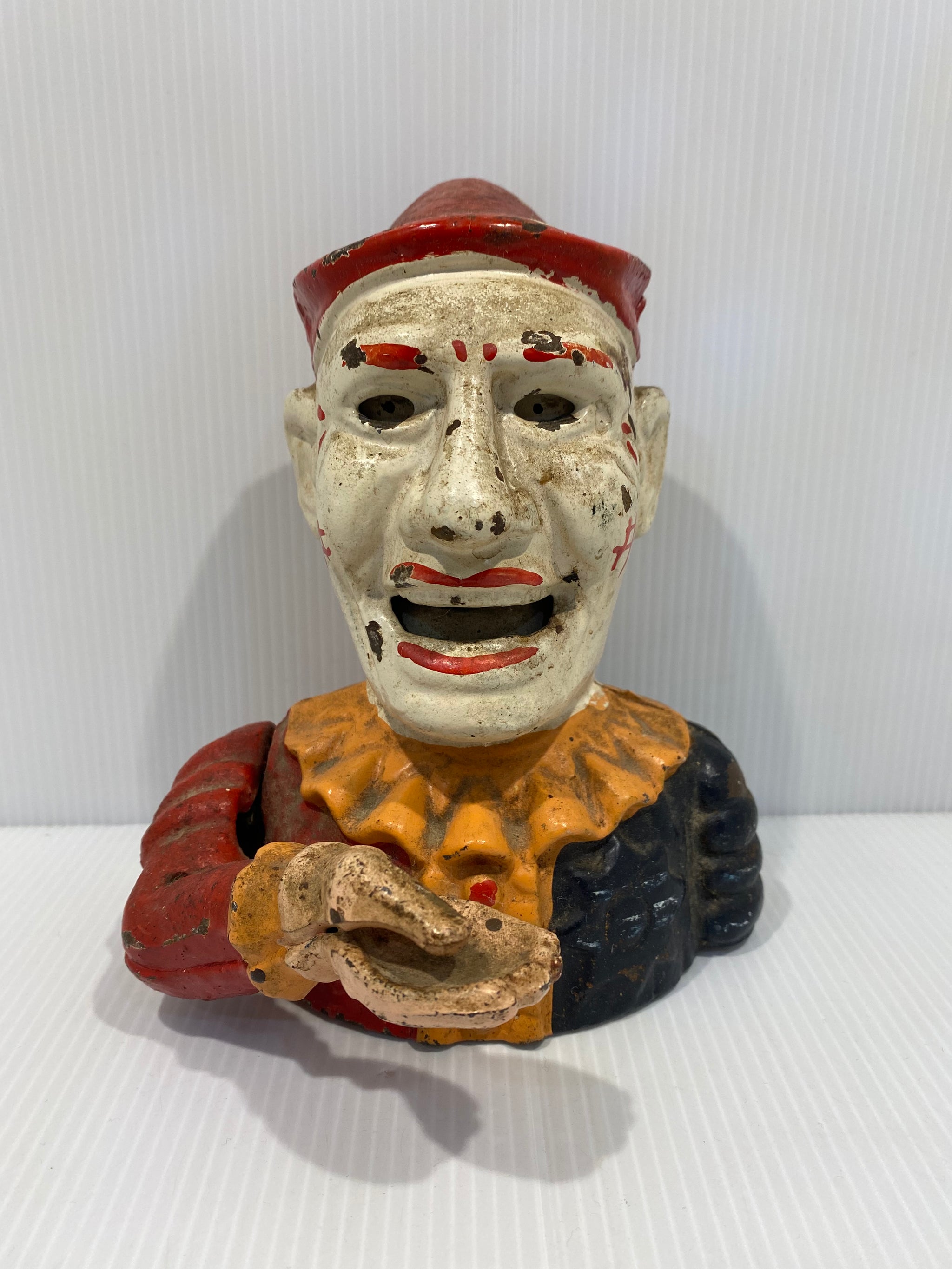 Early 1900s Humpty Dumpty Circus offers Clown Cast Iron Mechanical Bank